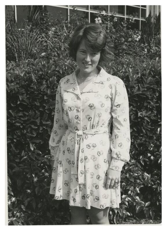 Woman standing outside the Administration Building