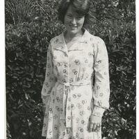 Woman standing outside the Administration Building